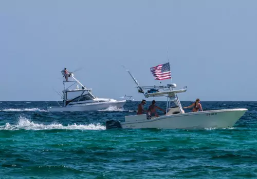 Two Fishing Charters in Tampa Bay FL, going out into deeper waters